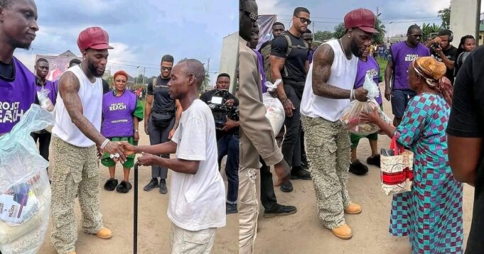 Singer Burna Boy Warms Heart, Shares Food Items With People in Port Harcourt (VIDEO)