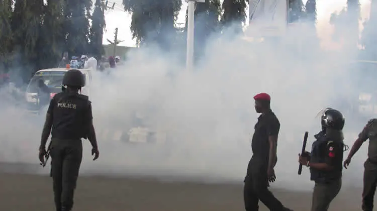 Independence Day: Police Fire Teargas at Protesters in Abuja [VIDEO]